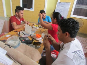 Youth Artisan Cooperative hard at work during a training workshop